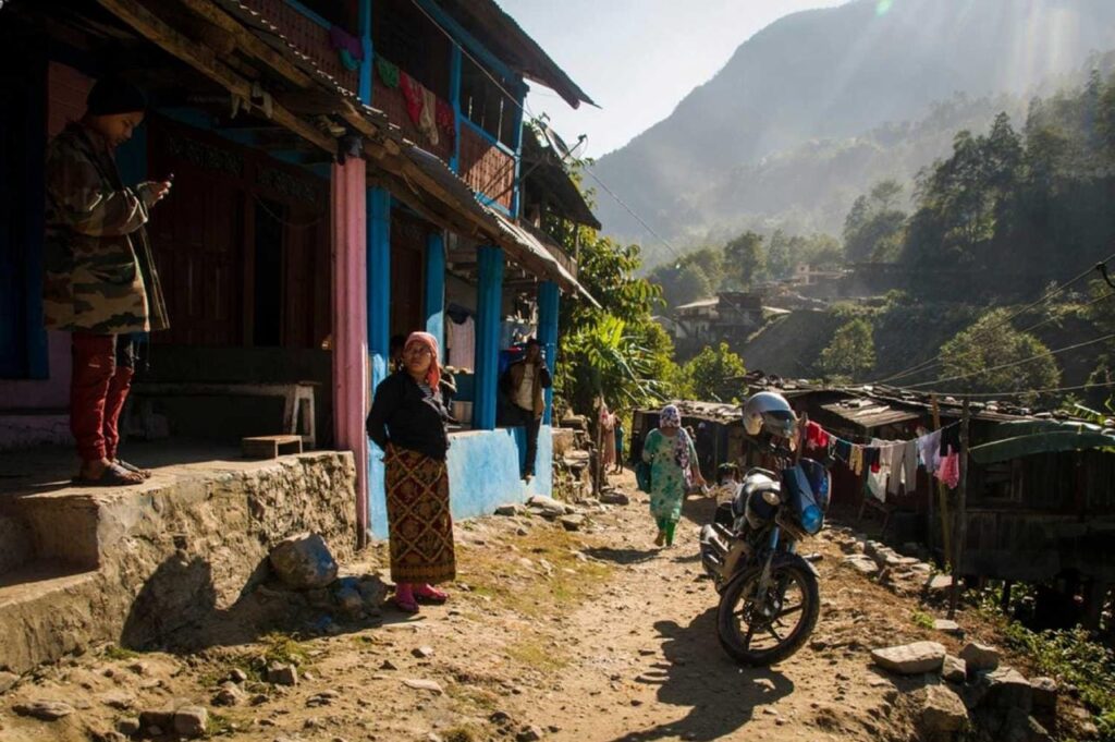 Local village life in Yuksom Sikkim with traditional houses and people